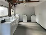 Washers and dryers in the laundry room at Mill Creek Marina & Campground - thumbnail