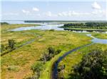 A green belt and water inlet at Old Florida RV Resort - thumbnail