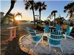 Chairs around the fire pit - thumbnail