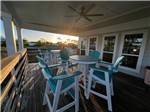 Chairs and tables on a patio - thumbnail