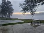 Concrete slabs with picnic tables at Lakeshore RV Park - thumbnail