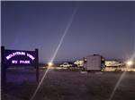 The neon lighted park sign at night at Mountain View RV Park - thumbnail