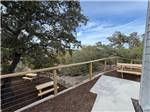 An elevated area overlooking picnic tables - thumbnail