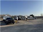 A row of travel trailers parked at site - thumbnail