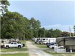 Row of RVs parked - thumbnail
