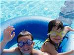 Kids in pool - thumbnail