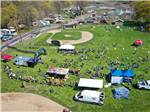 Aerial view of bike race event and tents - thumbnail