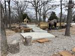 A bear statue and concrete steps - thumbnail