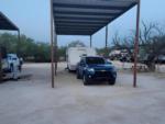Pickup truck with trailer at site Crossroads RV Park - Big Spring - thumbnail