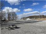 A picnic table at a gravel site - thumbnail