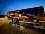 A large class A motorhome at sunset - thumbnail