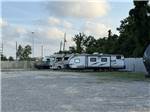 Variety of RVs parked at sites - thumbnail