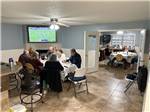 A group dining in the rec hall - thumbnail