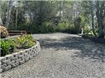 A gravel site with nice landscaping - thumbnail