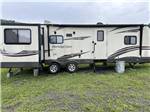 A travel trailer at a site - thumbnail