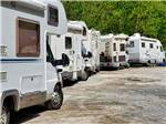 Row of RVs parked - thumbnail