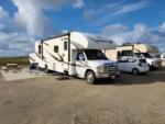 Parked RVs at site Magnolia Beach RV Park - thumbnail