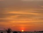 An orange sunset at Bells Island Campground - thumbnail