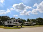 Parked RV's at site Quilly's Cozy Traveler RV Park - thumbnail