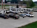 RVs and autos parked at Fairgrounds RV Park - WI - thumbnail