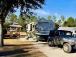 Parked RV at site Suwannee River Rendezvous Resort & Campground - thumbnail