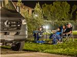 A family at their site - thumbnail
