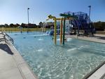 The pool with water play structure at Scottsbluff YMCA Trails West Camp - thumbnail