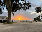 RV sites at sunset with a lake view at Pine Island RV and Marina - thumbnail