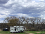 A travel trailer parked at site at Camping 109 - thumbnail