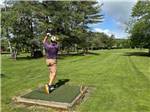 A man golfing - thumbnail