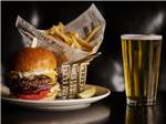 Hamburger, fries and a glass of beer - thumbnail
