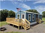 A rental with a porch and fire pit - thumbnail