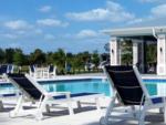 Lounge chairs by the pool - thumbnail