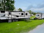Parked trailers at site 10 Acres Campground - thumbnail