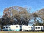 Parked RV's at site The Barn RV Park - thumbnail