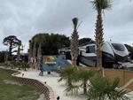 Welcome sign at site Oak Island Campground - thumbnail