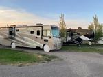 Parked RV at site Sugar City RV Park - thumbnail