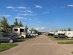 Parked trailer's and RV's at site Sugar City RV Park - thumbnail