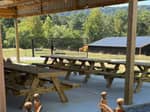 A covered area with picnic table - thumbnail