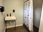 A shower and sink - thumbnail