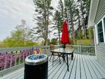 Patio with fire pit at Pine Grove Cottages - thumbnail