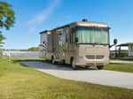 A motorhome in a paved site - thumbnail