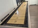 A shuffleboard table in the rec room - thumbnail