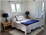 A cozy lodge bedroom - thumbnail