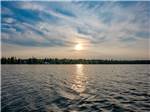 Sunset by the water - thumbnail