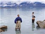 Two men fishing in Resurrection Bay - thumbnail