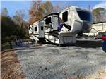 A fifth wheel with slide-outs at a site - thumbnail