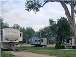 Travel trailers parked in RV spaces - thumbnail