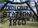 A rustic metal park sign - thumbnail