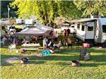 People enjoying a camping community - thumbnail